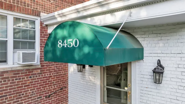 a view of a swimming pool with a terrace