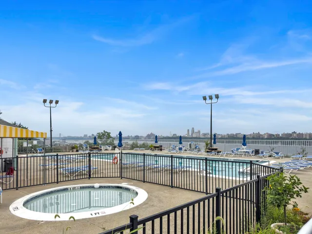 a view of a city with tall buildings