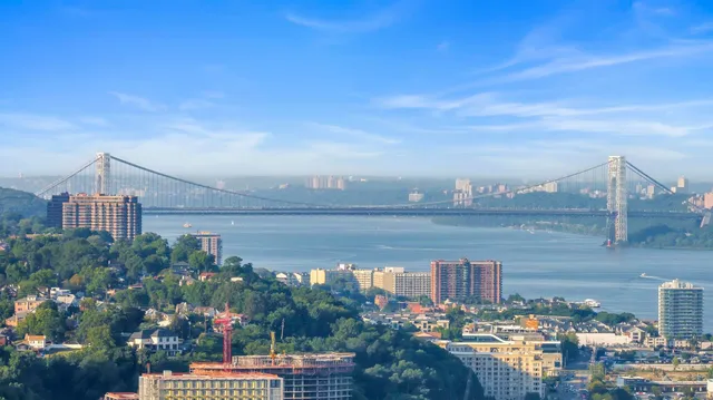 an aerial view of a houses with outdoor space and lake view