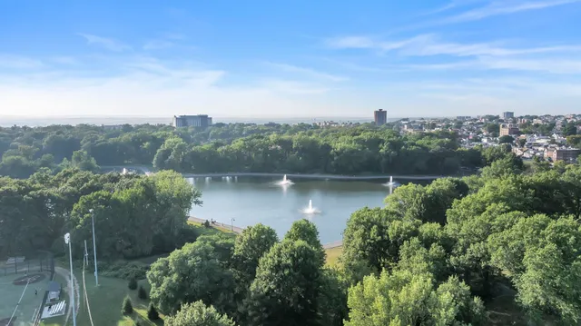 a view of a city with tall buildings