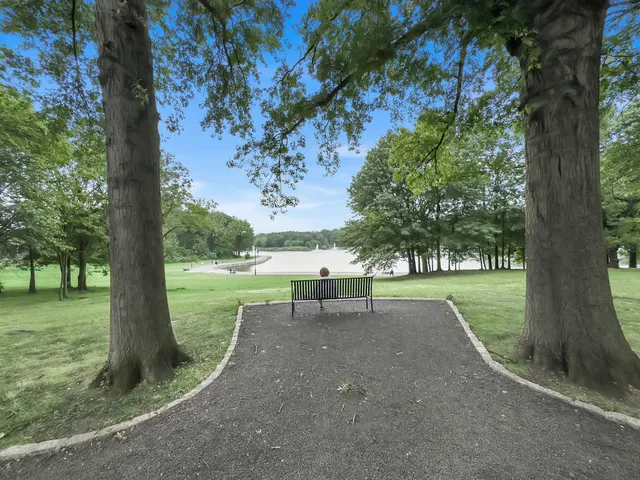a view of a lake with a big yard