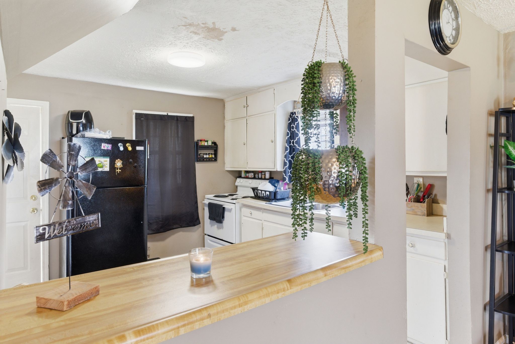 703 McCurdy Road White House, TN 37188 - Photo 11 of 26 a kitchen with stainless steel appliances kitchen island granite countertop a refrigerator and a stove top oven
