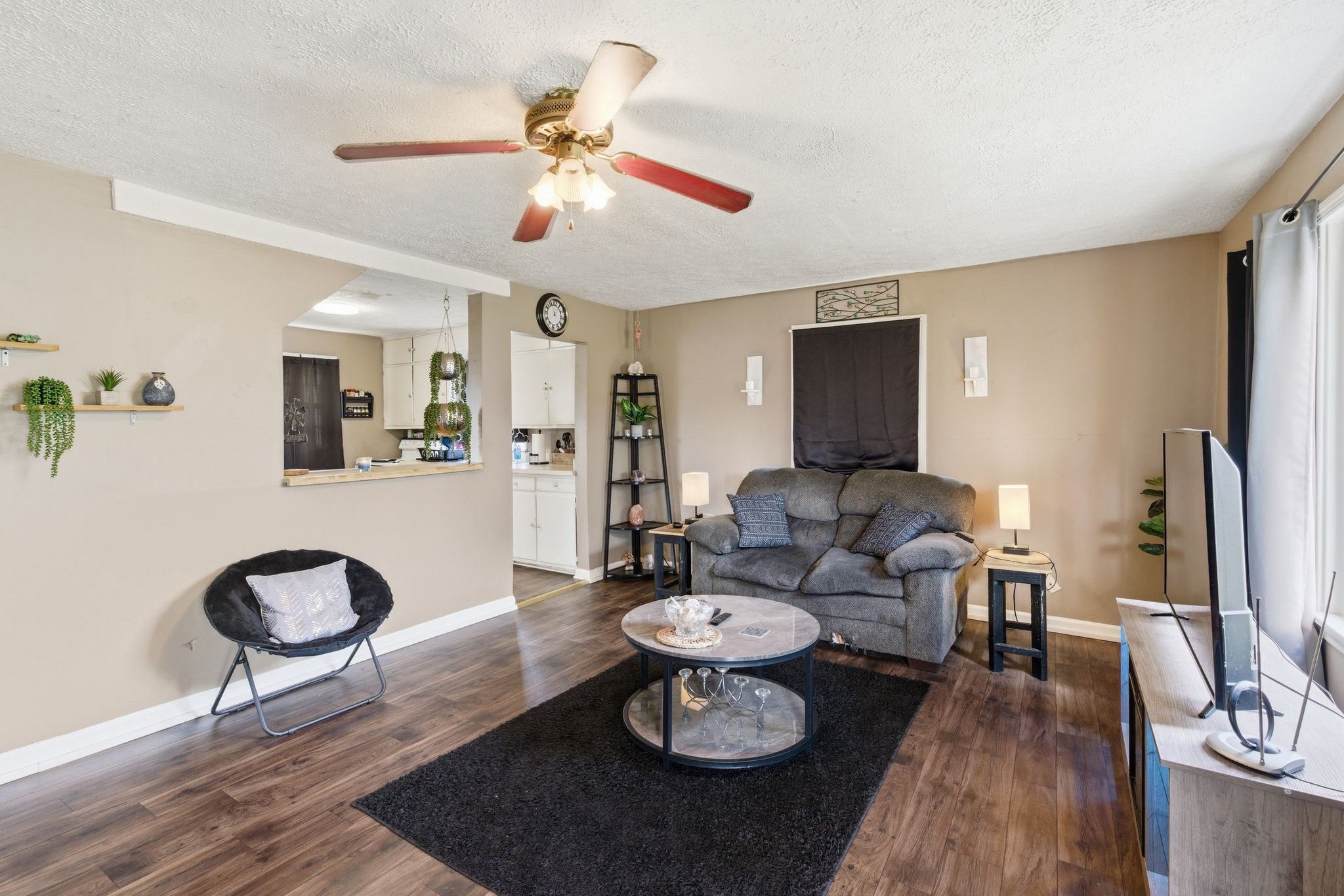 703 McCurdy Road White House, TN 37188 - Photo 8 of 26 a living room with furniture a rug and a flat screen tv