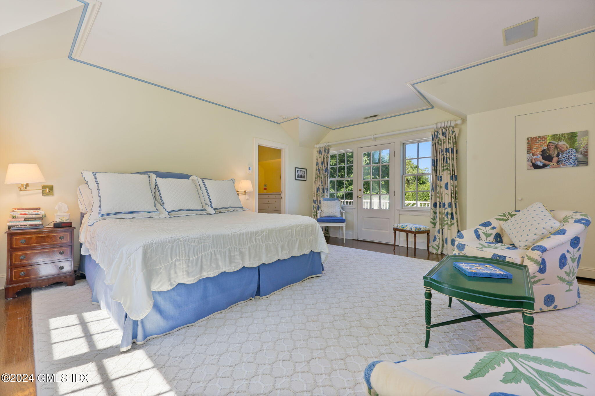 21 Dempsey Lane Greenwich, CT 06830 - Photo 11 of 32 a bedroom with a bed and wooden floor