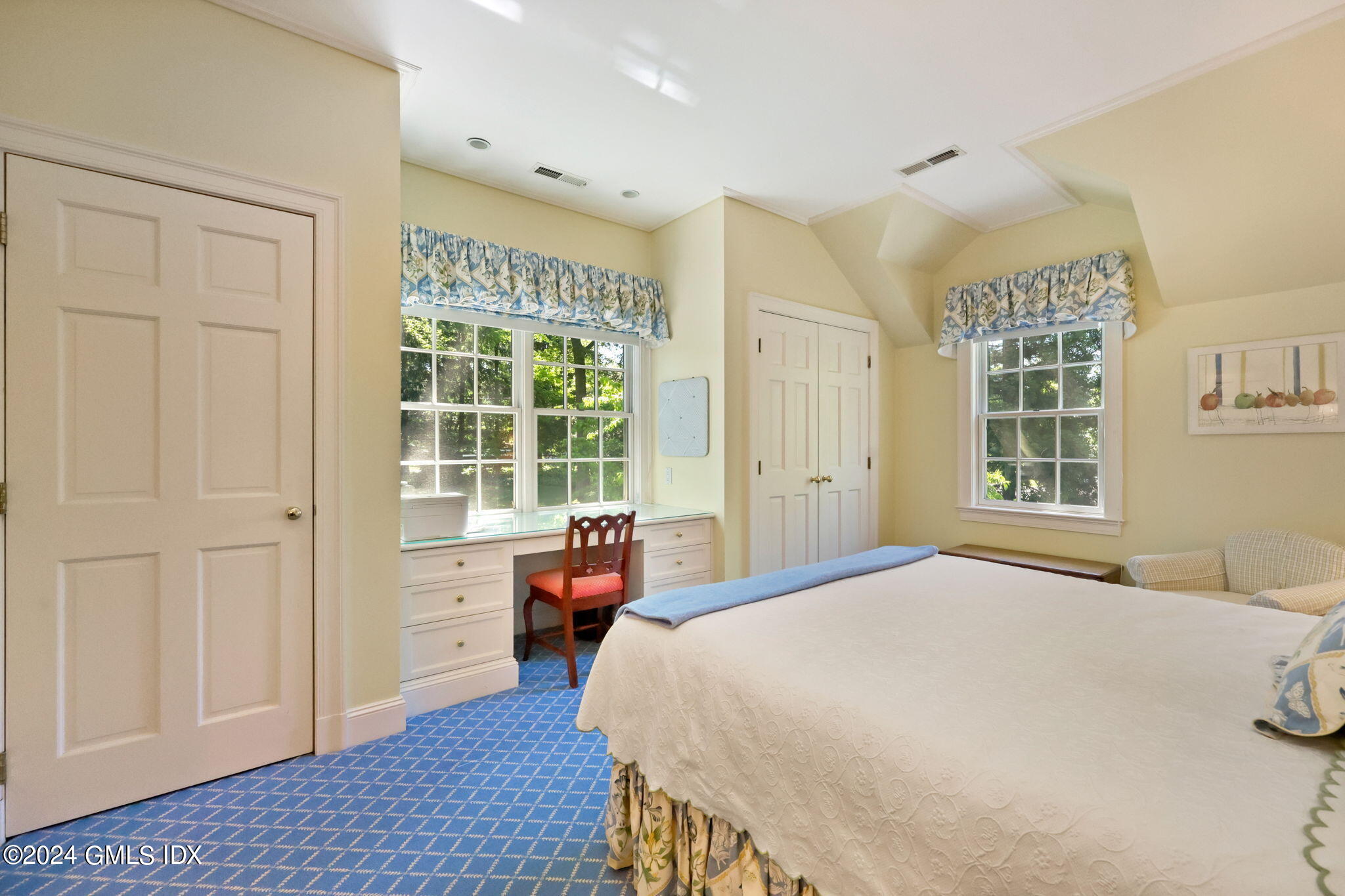 21 Dempsey Lane Greenwich, CT 06830 - Photo 17 of 32 a bedroom with a bed and wooden floor
