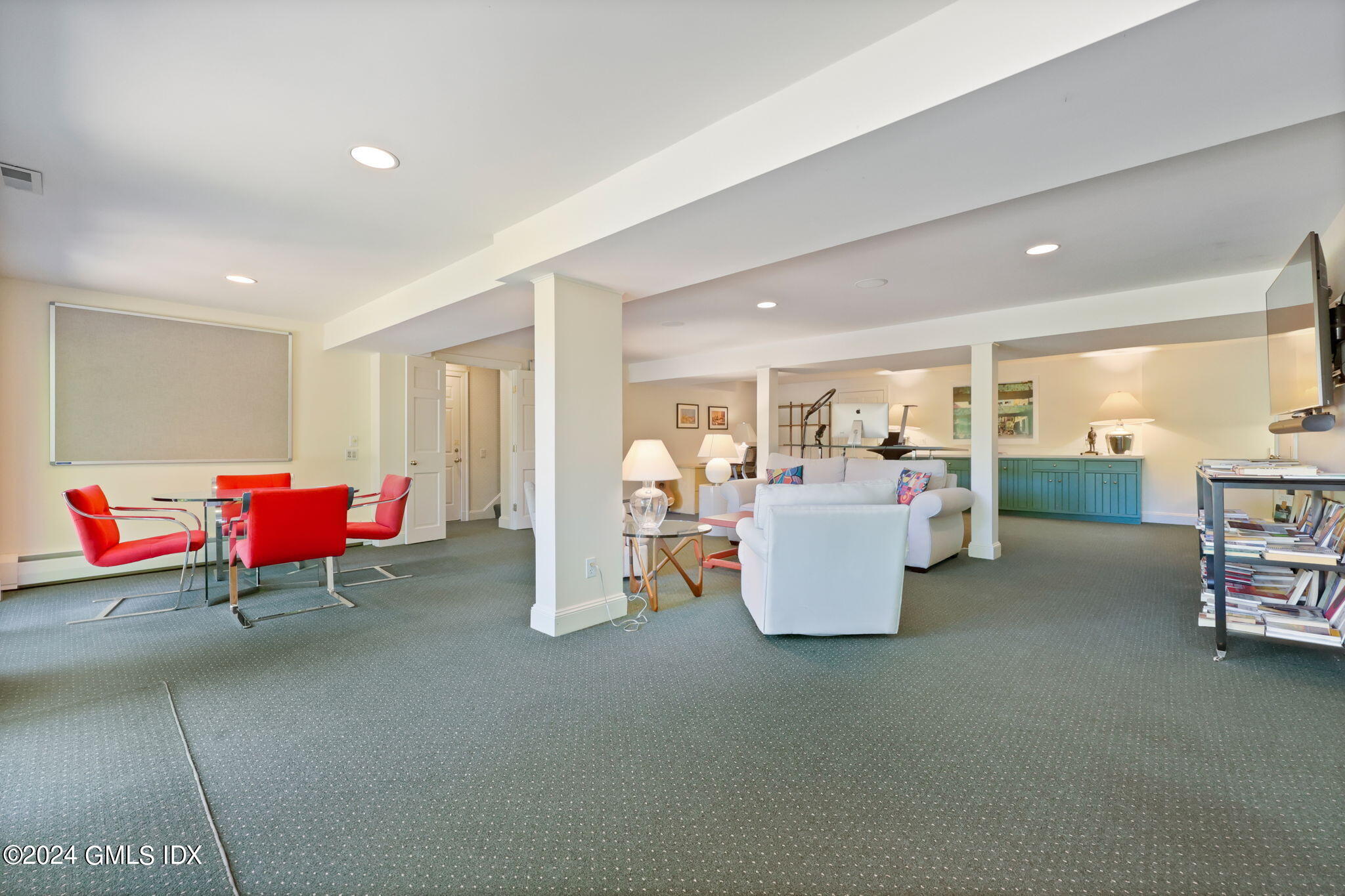 21 Dempsey Lane Greenwich, CT 06830 - Photo 19 of 32 a living room with furniture and a table