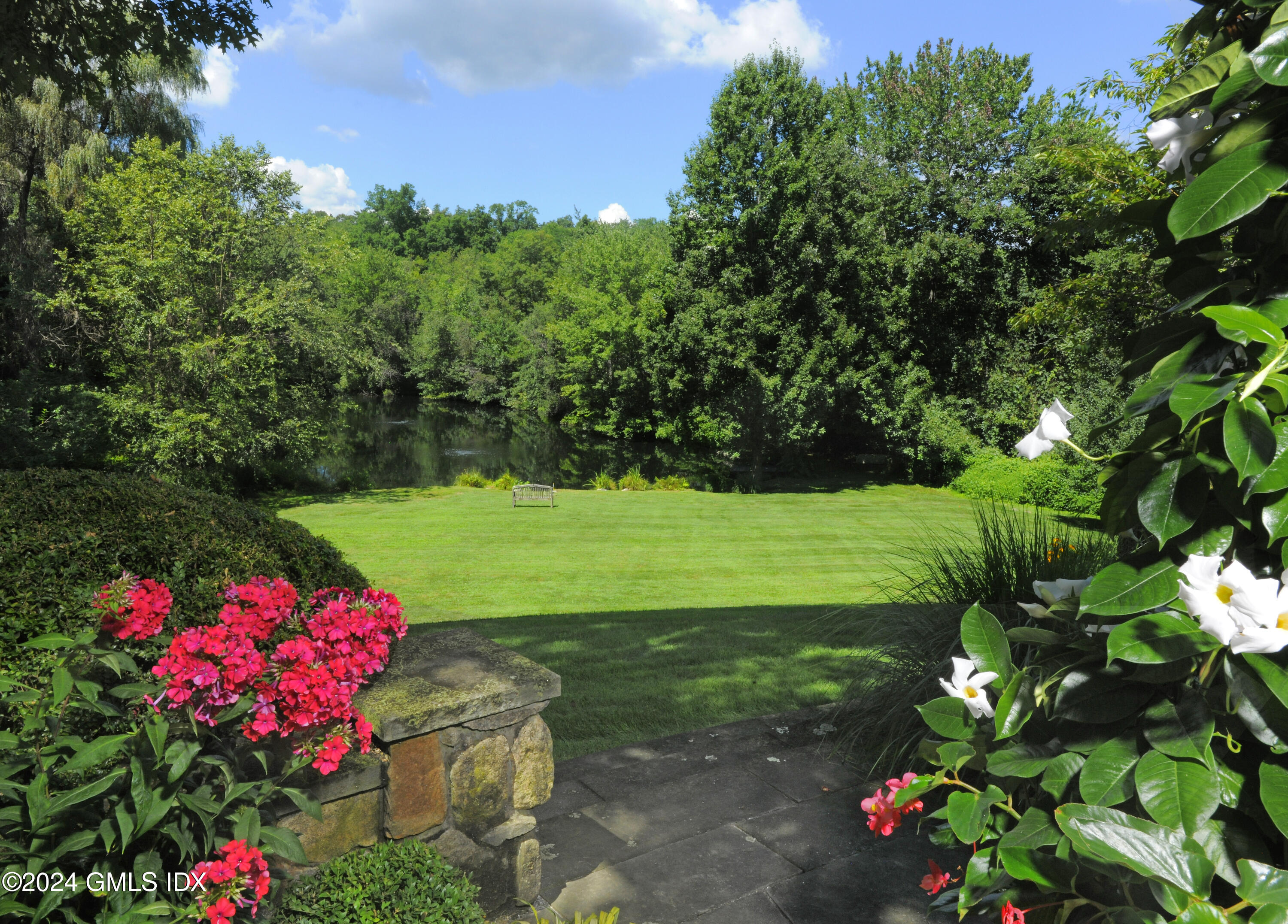 21 Dempsey Lane Greenwich, CT 06830 - Photo 25 of 32 a view of a flower in a garden