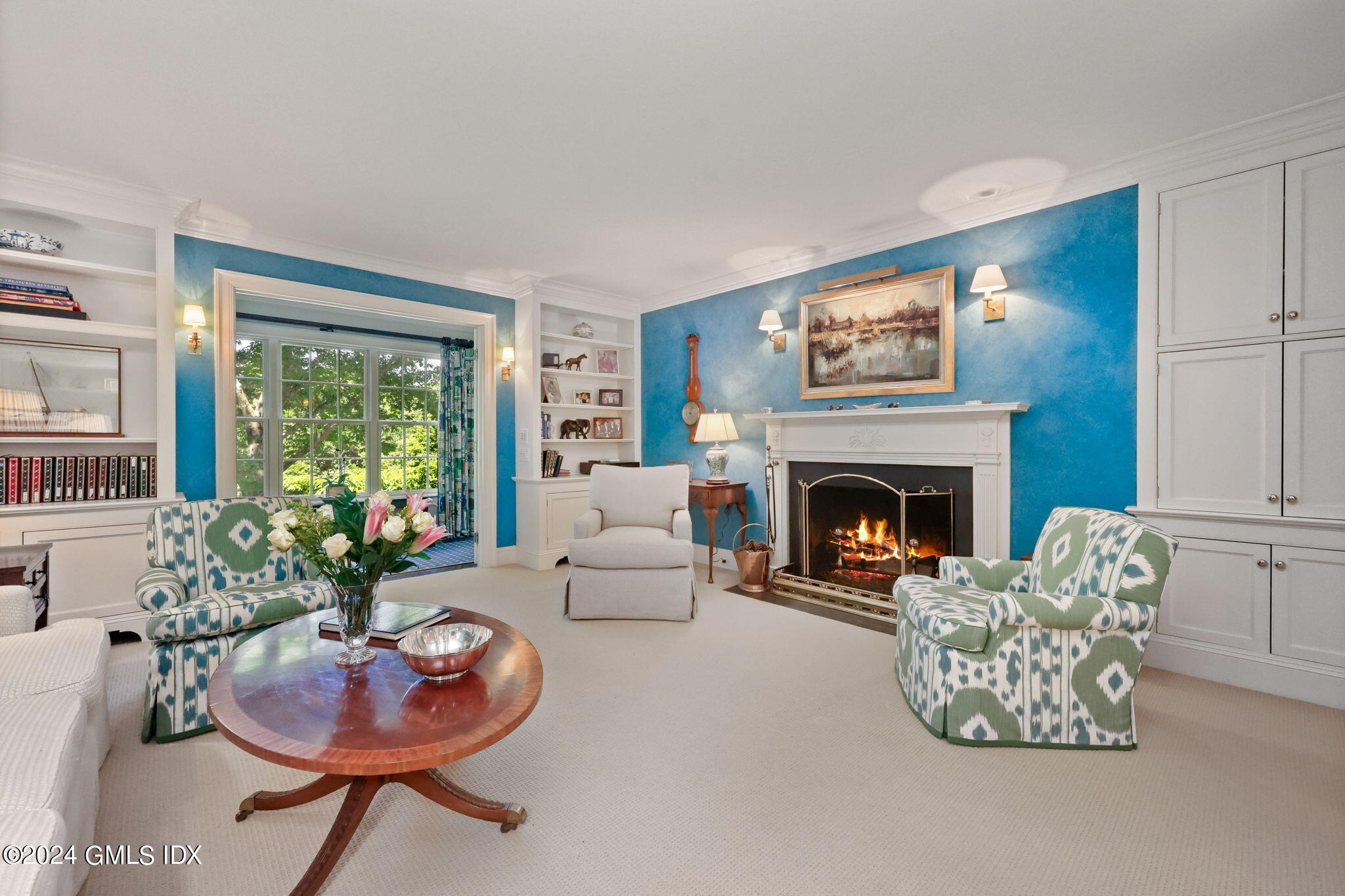 21 Dempsey Lane Greenwich, CT 06830 - Photo 3 of 32 a living room with furniture and a fireplace