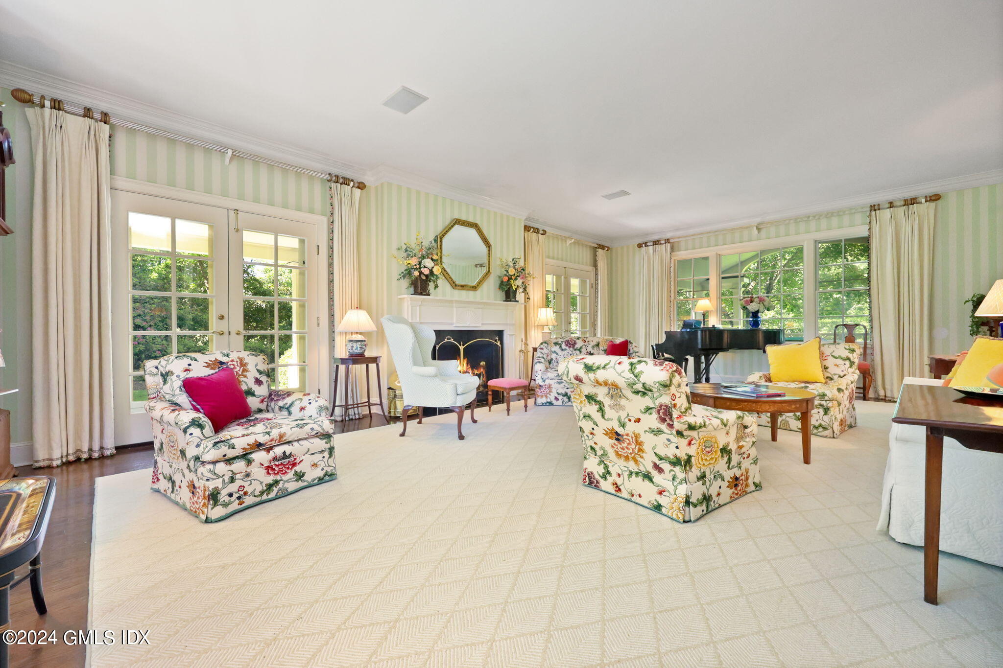 21 Dempsey Lane Greenwich, CT 06830 - Photo 4 of 32 a living room with furniture and a fireplace