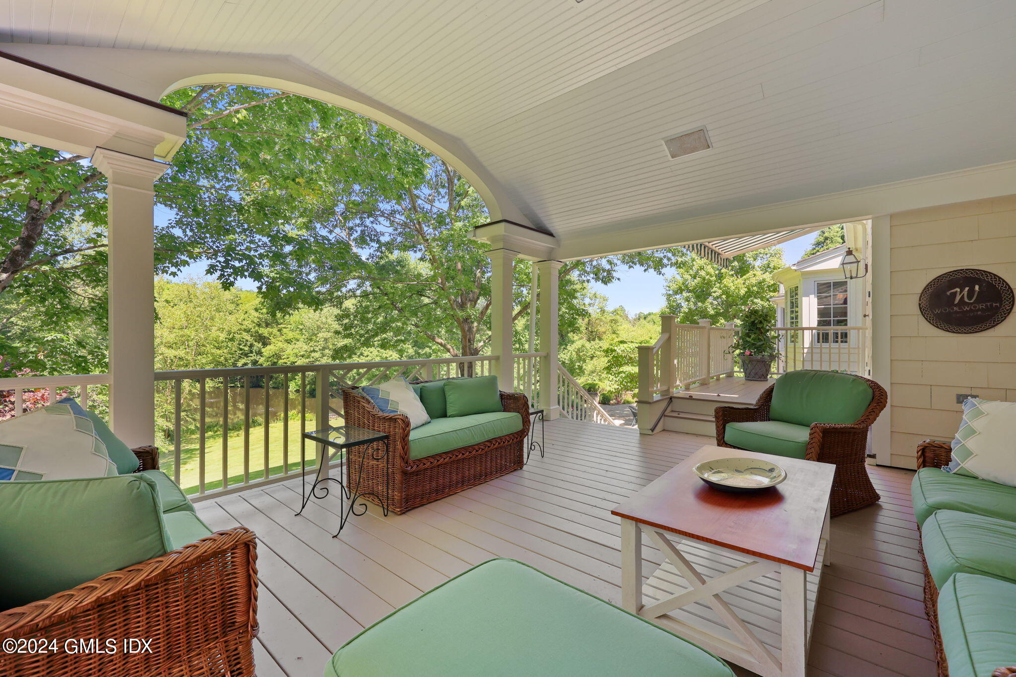 21 Dempsey Lane Greenwich, CT 06830 - Photo 5 of 32 a outdoor living space with furniture potted plant and a large window
