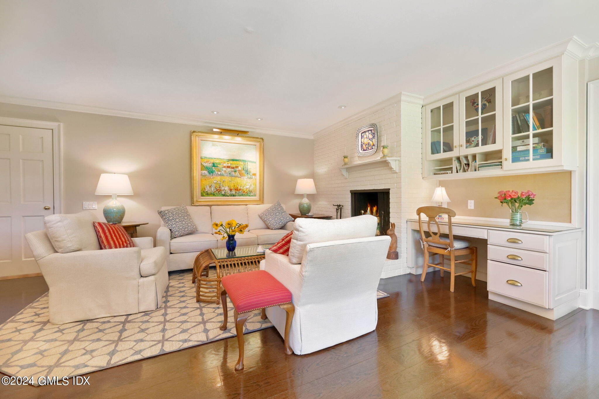 21 Dempsey Lane Greenwich, CT 06830 - Photo 6 of 32 a living room with fireplace furniture and a wooden floor