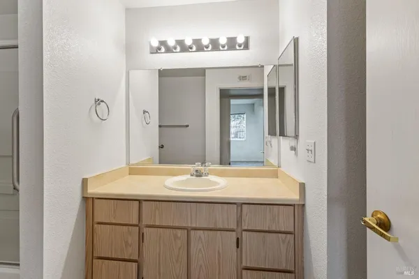 a bathroom with a sink and a toilet