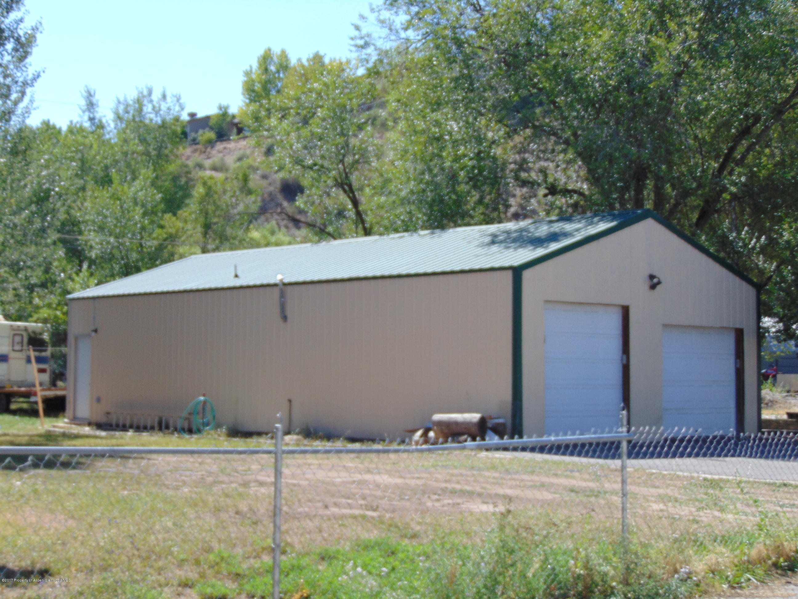 657 Park Avenue Rifle, CO 81650 - Photo 9 of 41 a view of a house with a outdoor space