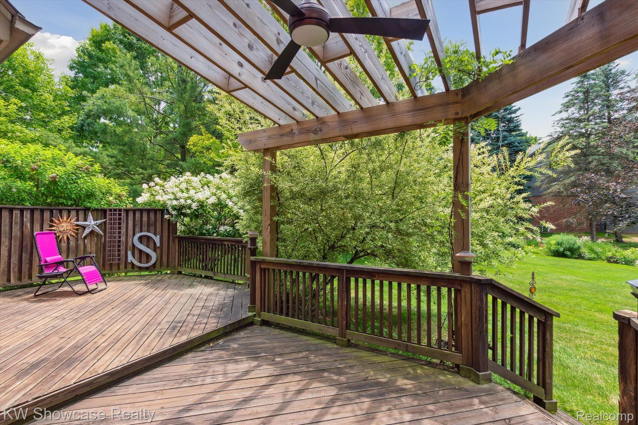 47647 Rochester Drive Novi, MI 48374 - Photo 6 of 36 The back deck and pergola.
