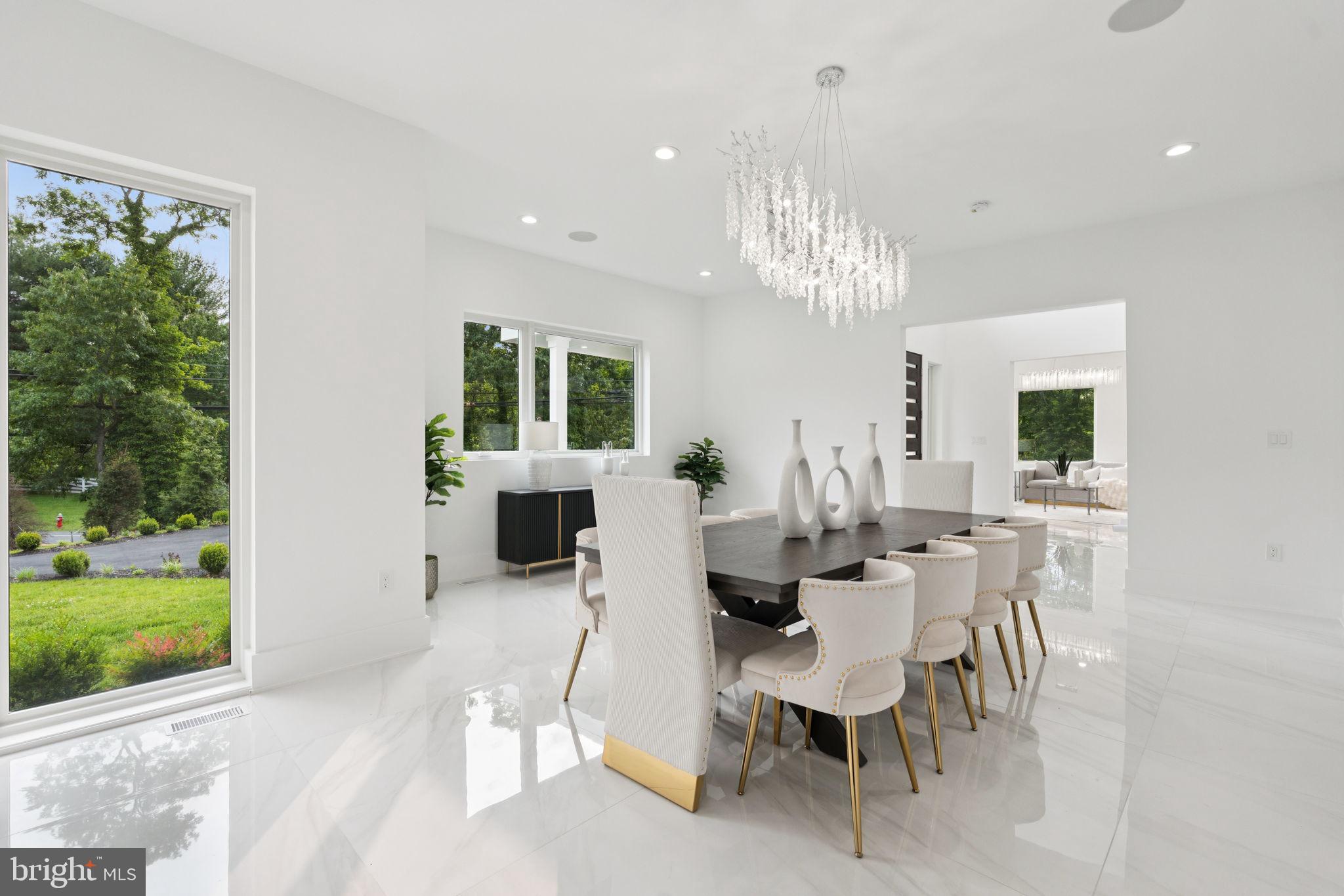 2209 Hunter Mill Road Vienna, VA 22181 - Photo 23 of 63 a view of a dining room with furniture window and outside view