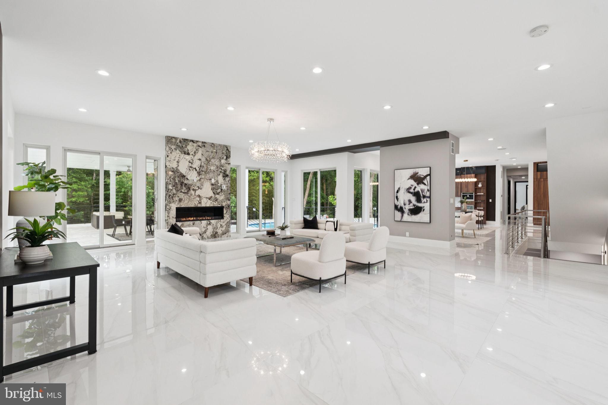 2209 Hunter Mill Road Vienna, VA 22181 - Photo 4 of 63 a living room with fireplace furniture and white walls