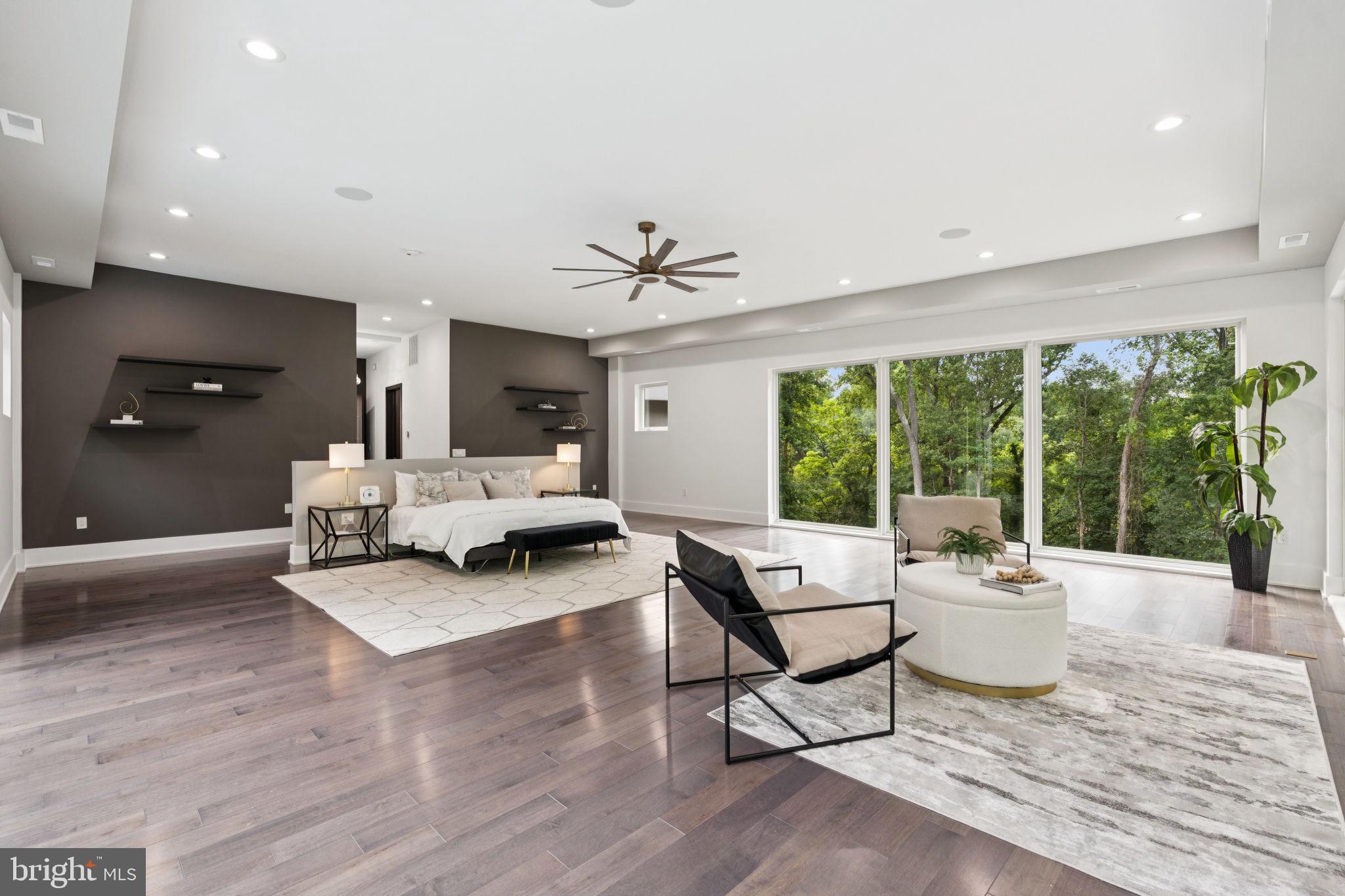 2209 Hunter Mill Road Vienna, VA 22181 - Photo 42 of 63 a living room with furniture and a large window