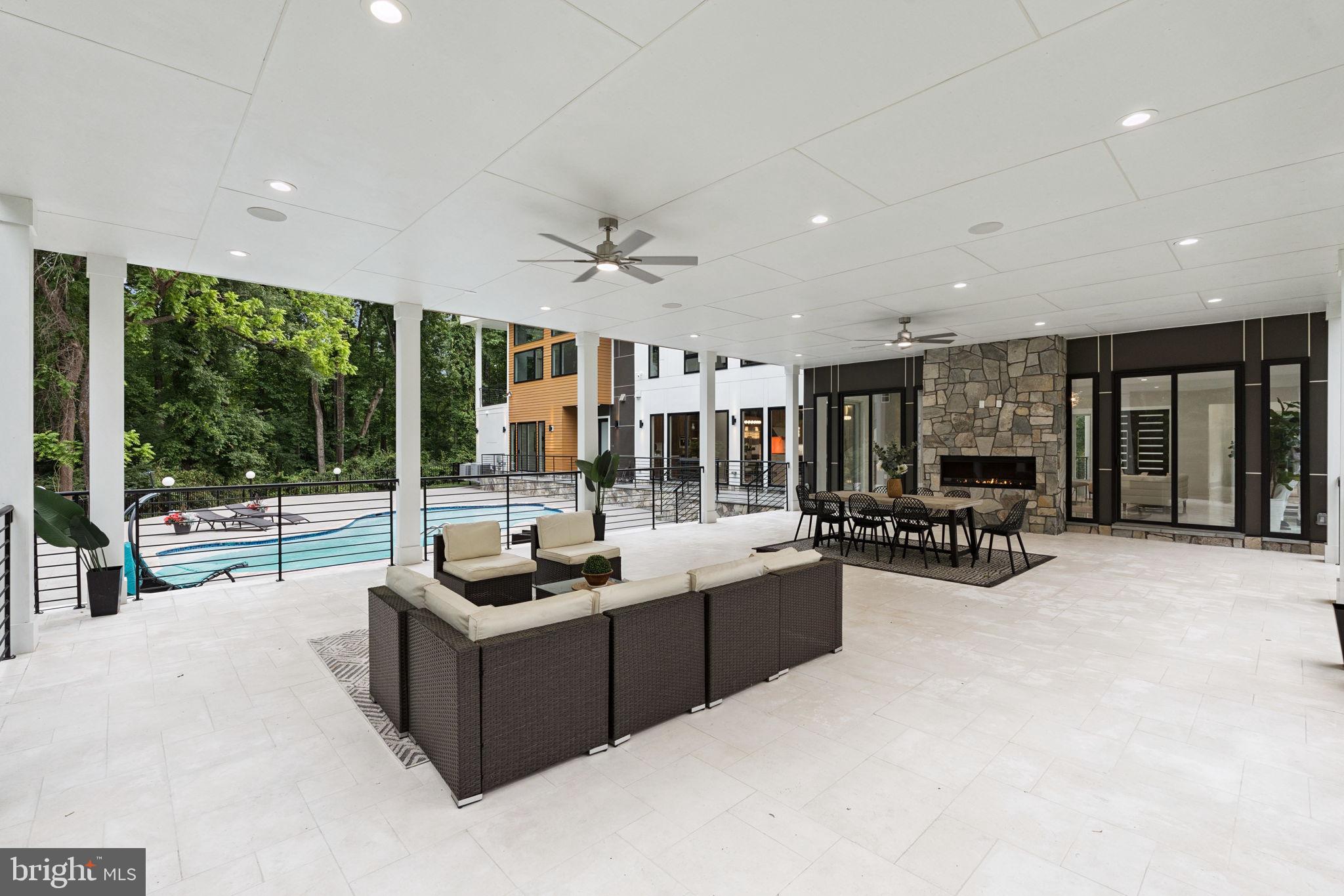 2209 Hunter Mill Road Vienna, VA 22181 - Photo 57 of 63 a living room with furniture and a large window with outer view