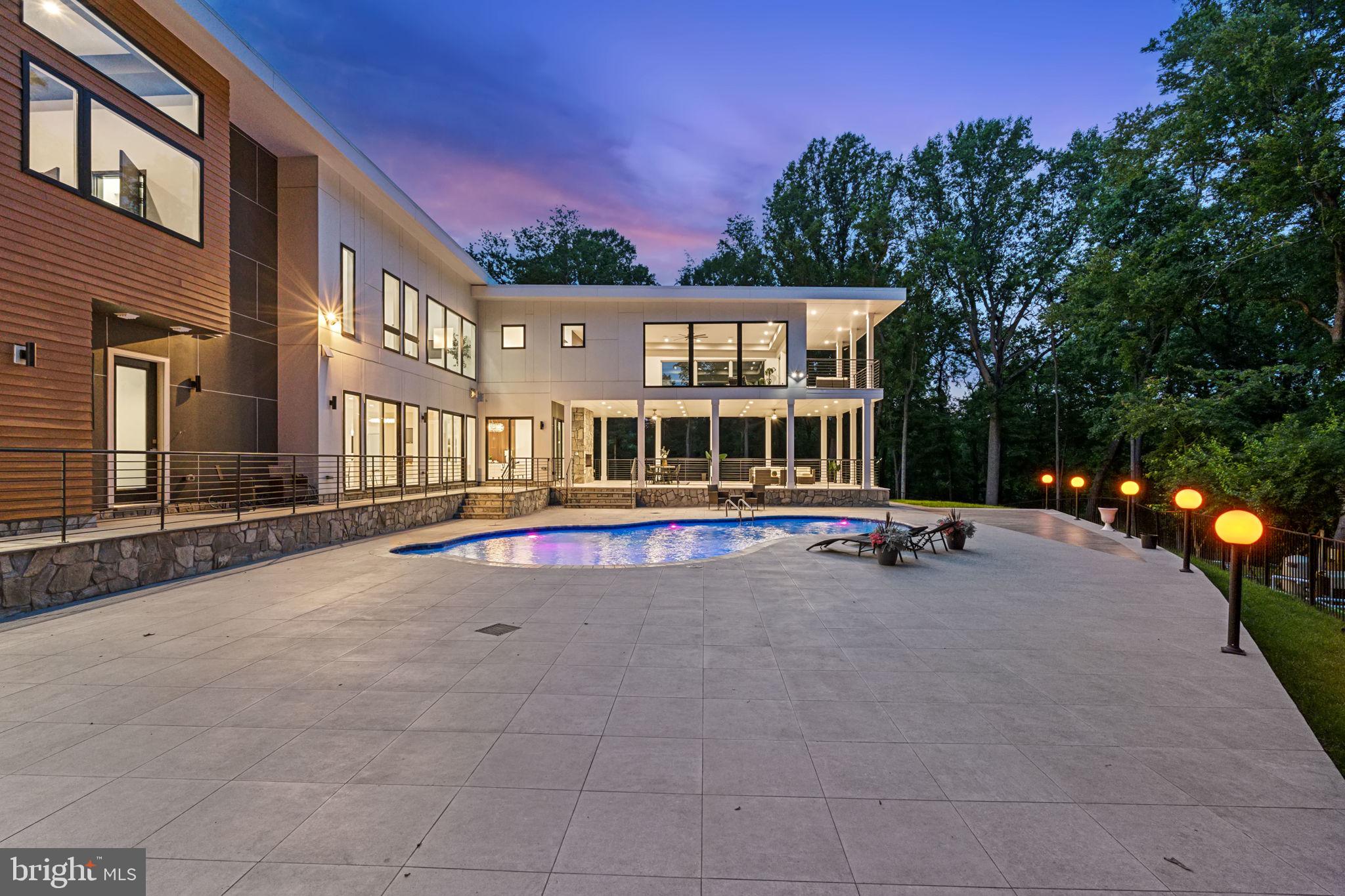 2209 Hunter Mill Road Vienna, VA 22181 - Photo 62 of 63 a view of a house with a yard