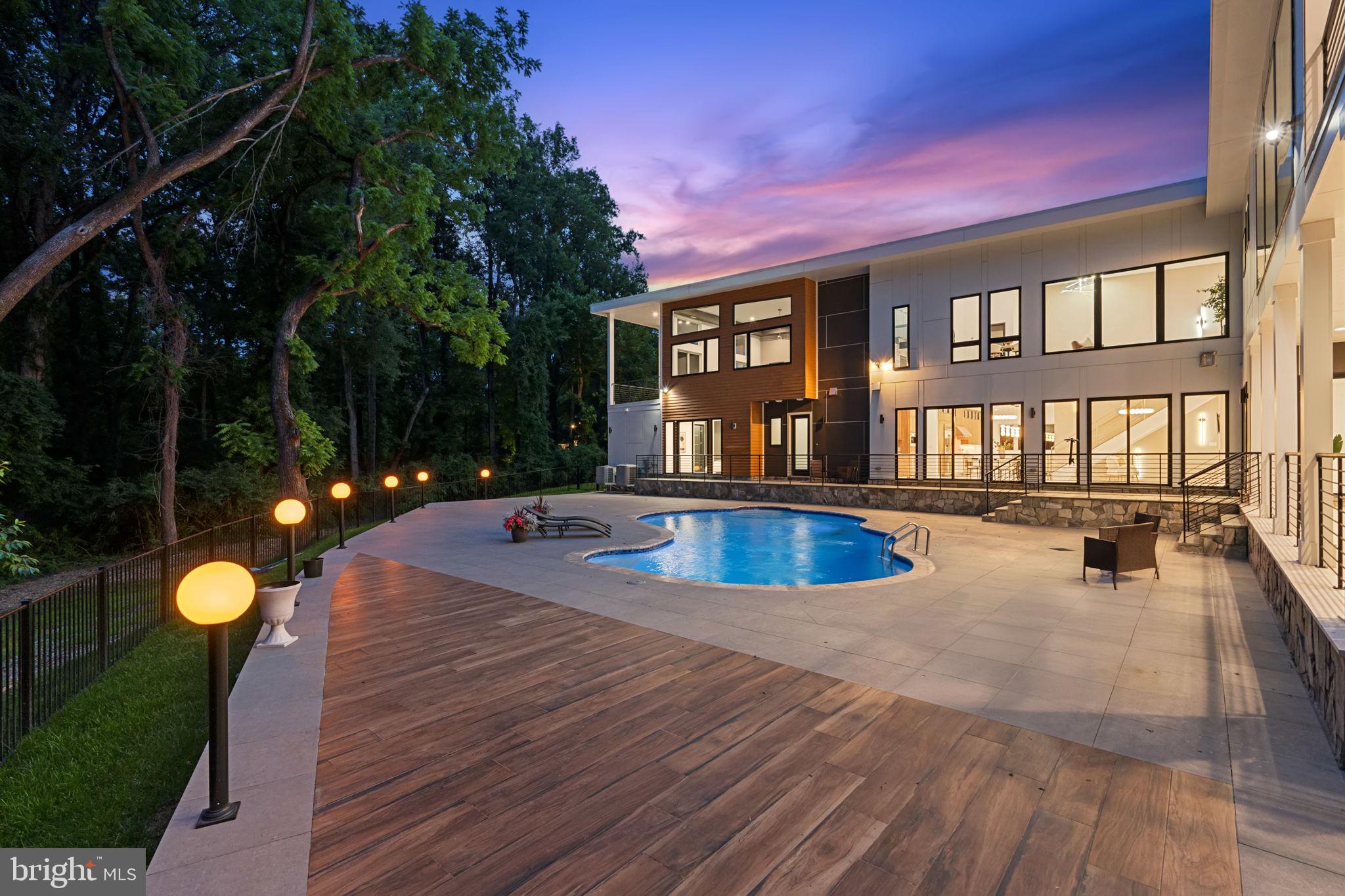 2209 Hunter Mill Road Vienna, VA 22181 - Photo 63 of 63 a view of a house with swimming pool and sitting area