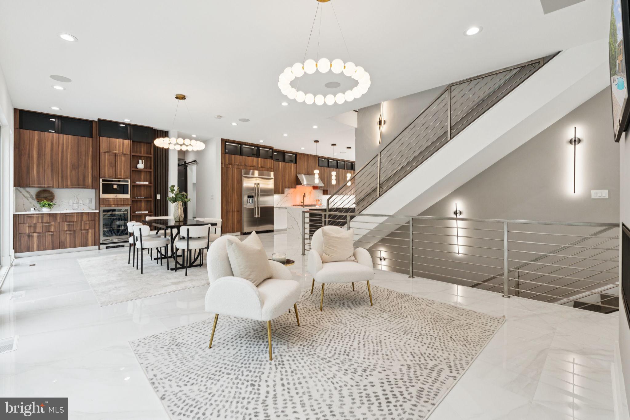 2209 Hunter Mill Road Vienna, VA 22181 - Photo 7 of 63 a living room with furniture and a chandelier