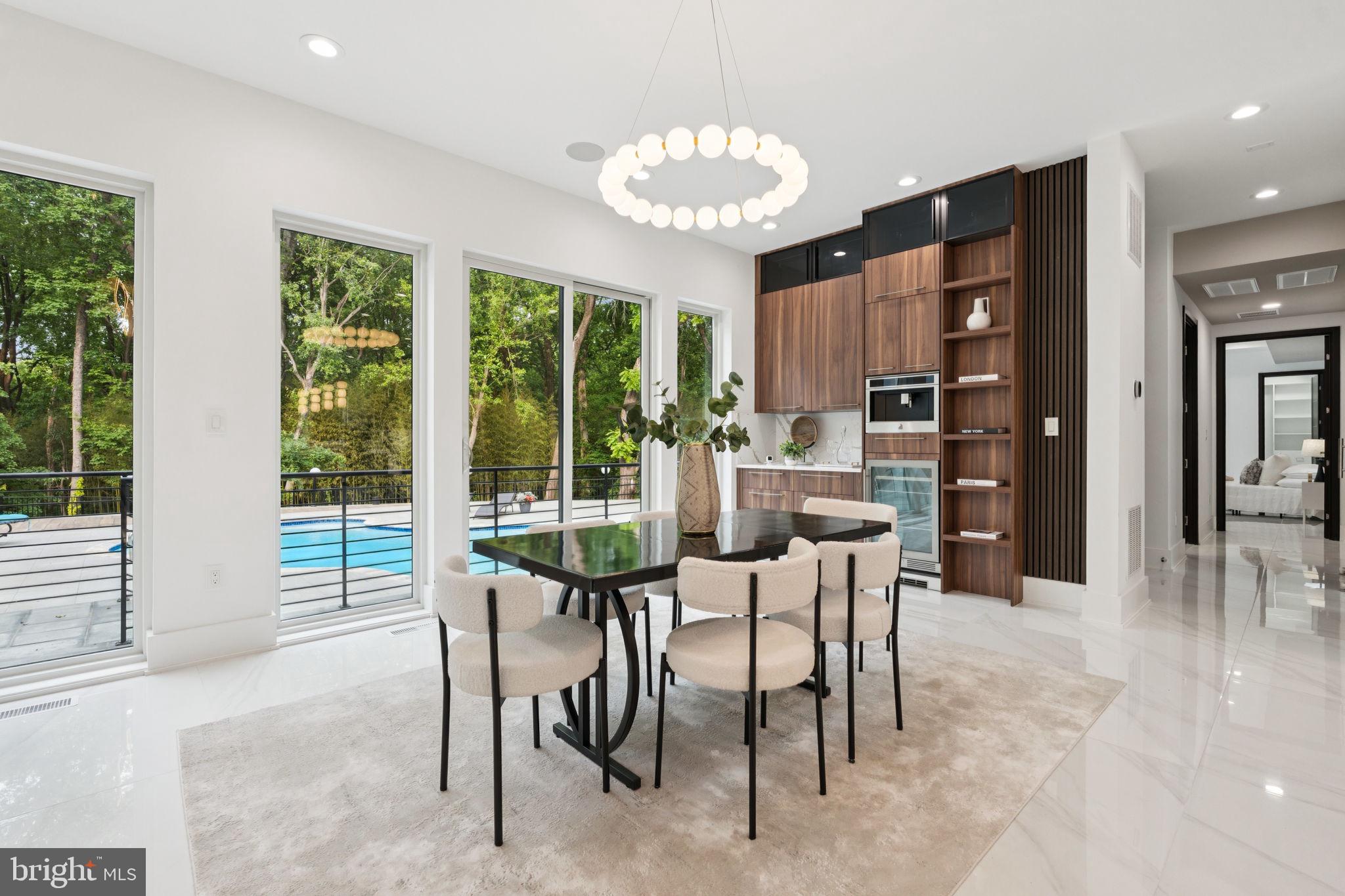 2209 Hunter Mill Road Vienna, VA 22181 - Photo 9 of 63 a dining room with furniture and window