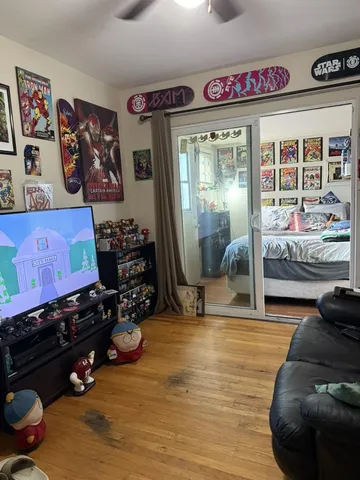 a room with furniture and wooden floor