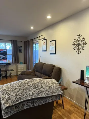 a bedroom with a bed and dresser