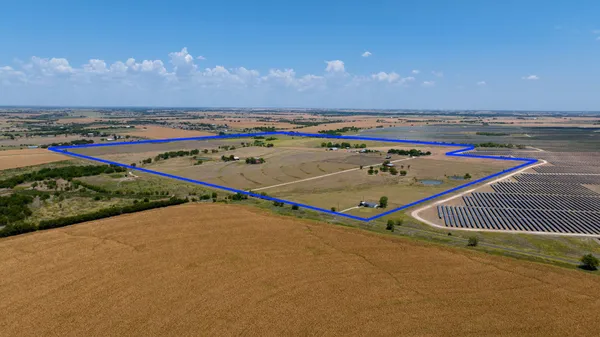 a view of swimming pool with outdoor space and seating area