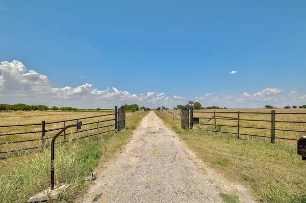 a view of ocean with sunset