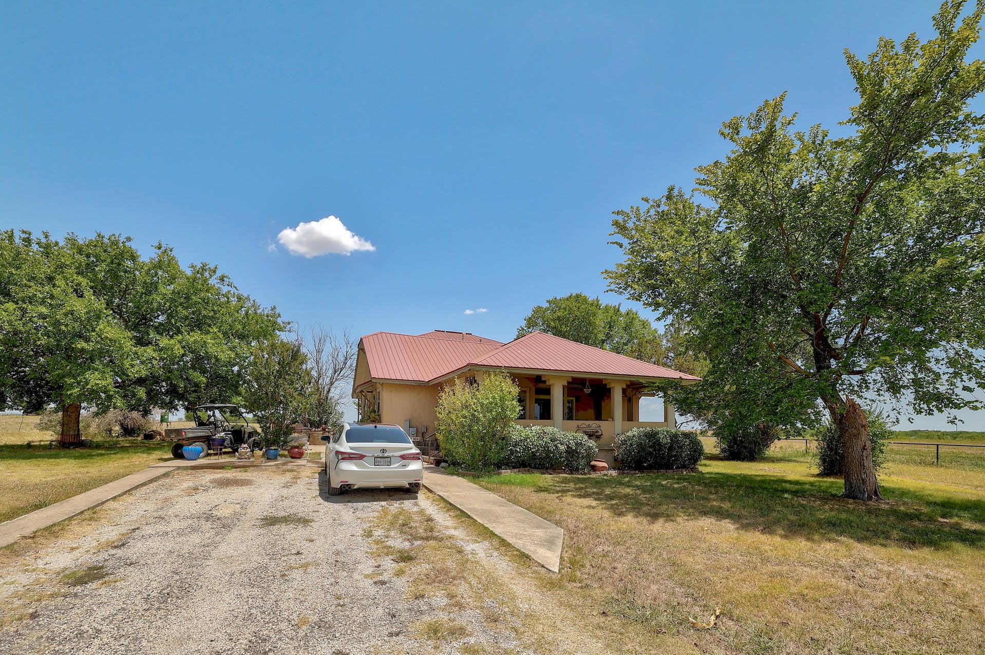 13212 Sandeen Road Coupland, TX 78615 - Photo 7 of 17 a front view of a house with a yard and garage