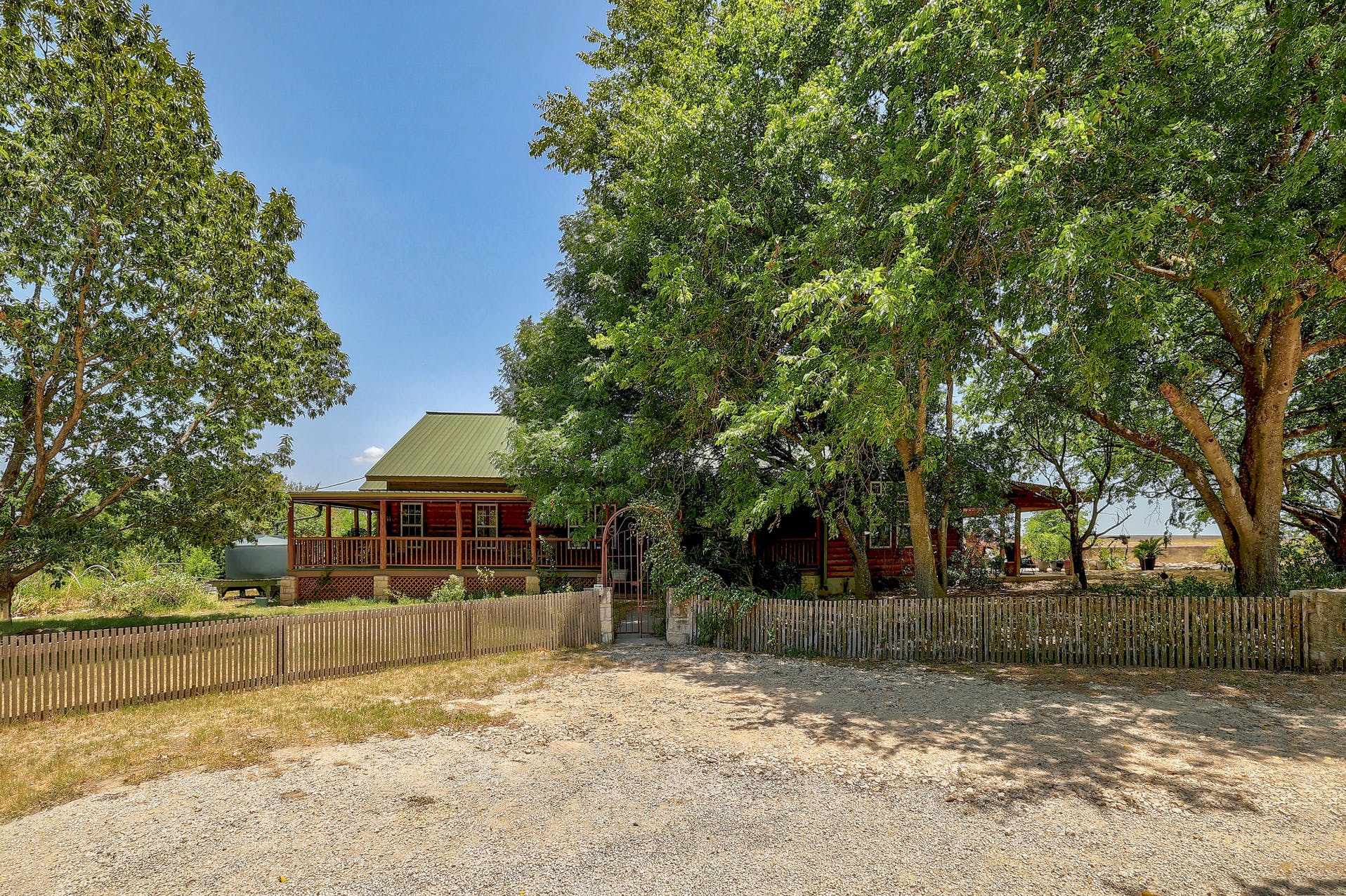 13212 Sandeen Road Coupland, TX 78615 - Photo 9 of 17 a view of a house with a yard