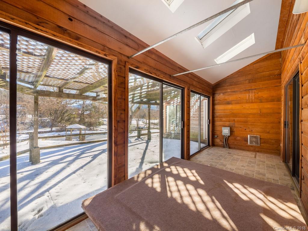 551 Bee Tree Road Swannanoa, NC 28778 - Photo 13 of 29 a view of a room with a large window