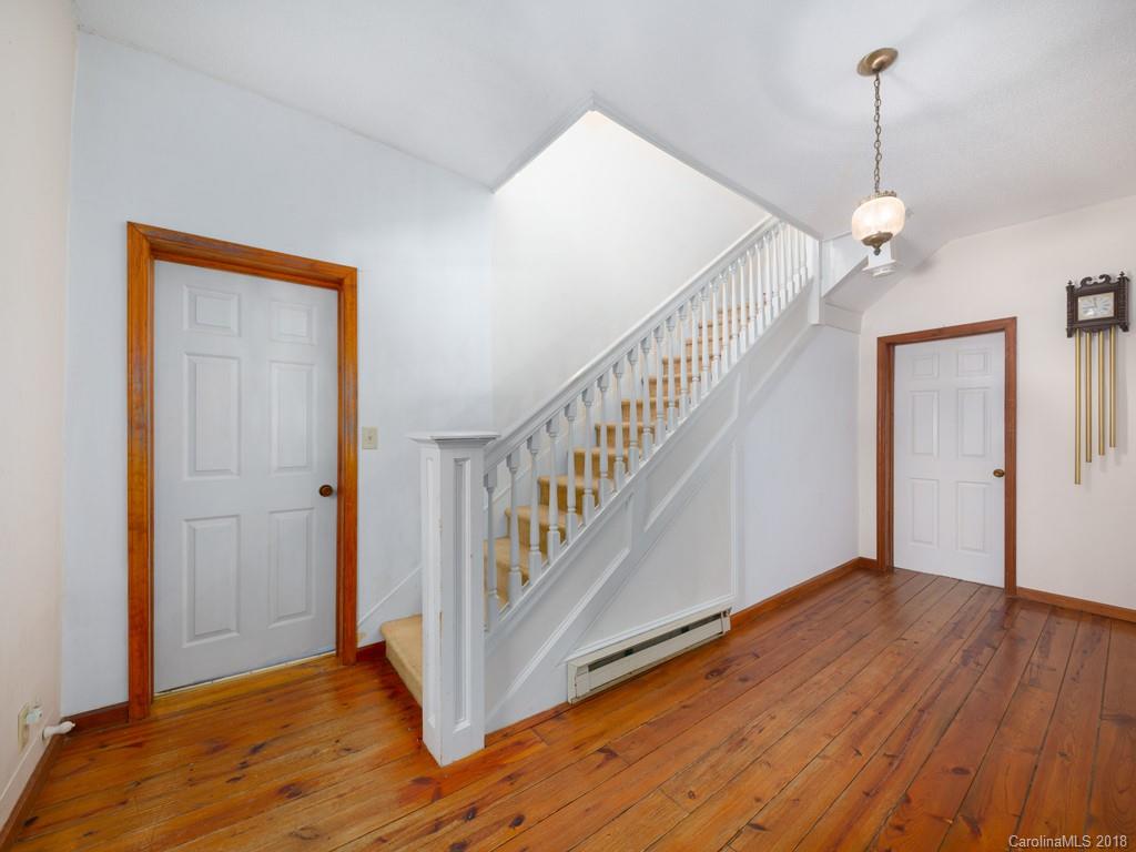 551 Bee Tree Road Swannanoa, NC 28778 - Photo 16 of 29 a view of an entryway with wooden floor