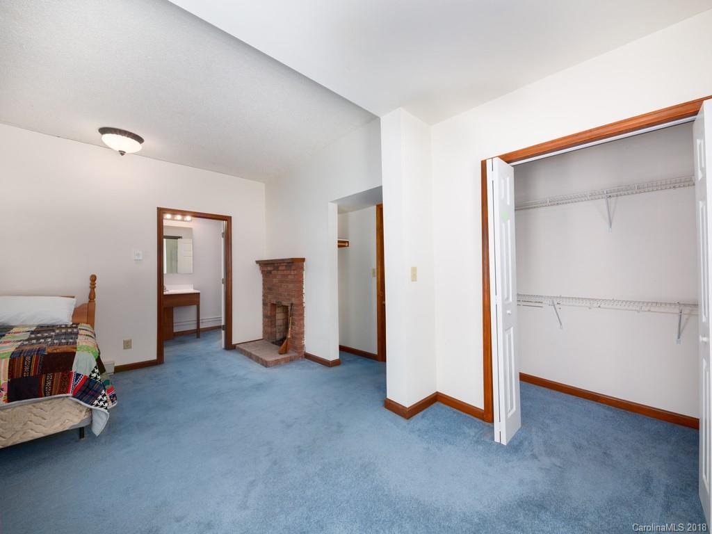 551 Bee Tree Road Swannanoa, NC 28778 - Photo 18 of 29 a view of empty room with closet