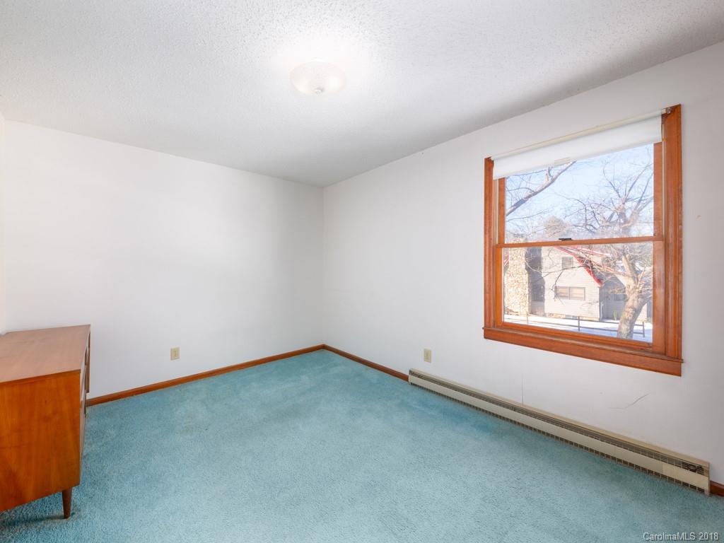 551 Bee Tree Road Swannanoa, NC 28778 - Photo 22 of 29 an empty room with a window