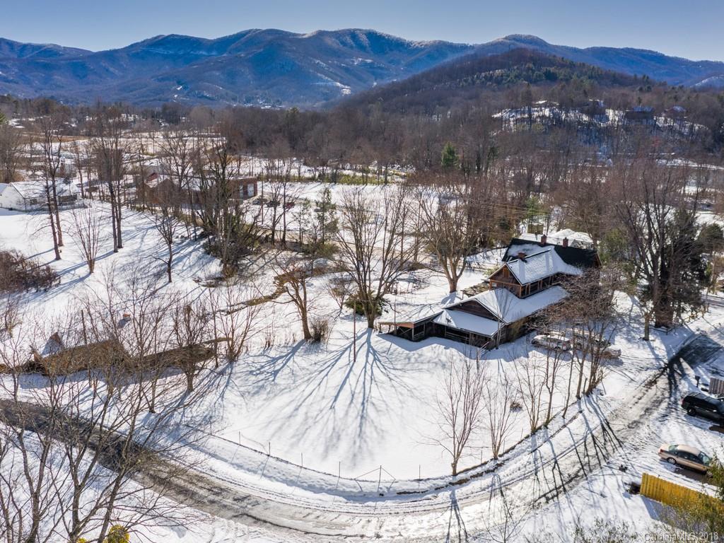 551 Bee Tree Road Swannanoa, NC 28778 - Photo 24 of 29 a view of a lake with a mountain