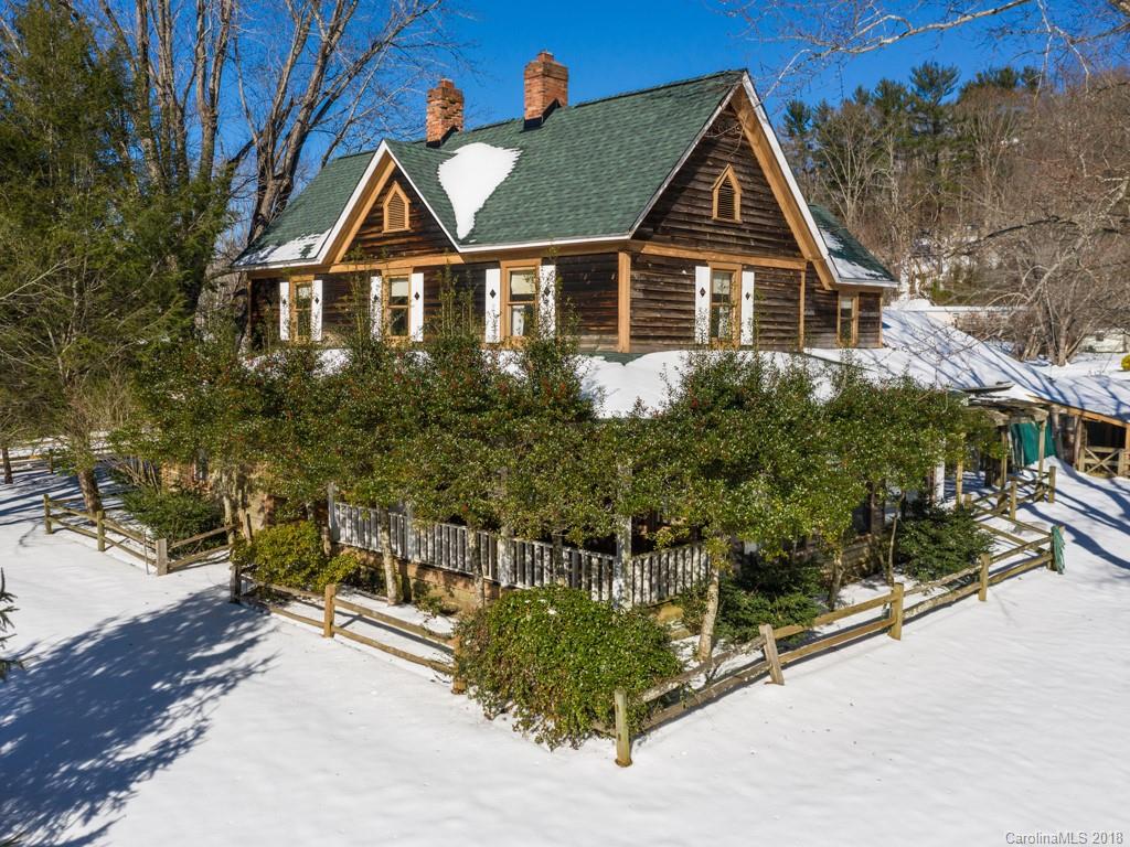 551 Bee Tree Road Swannanoa, NC 28778 - Photo 26 of 29 a front view of a house with a yard