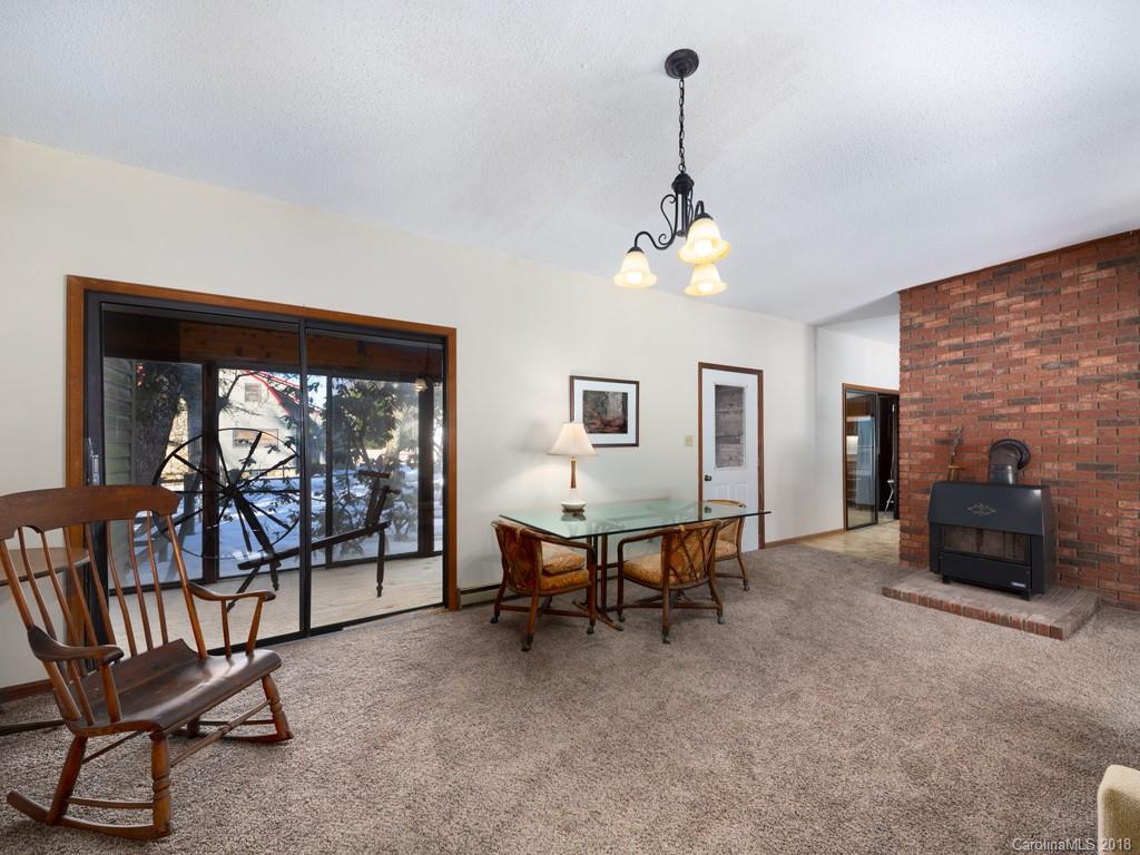 551 Bee Tree Road Swannanoa, NC 28778 - Photo 8 of 29 a view of a livingroom with furniture and a window