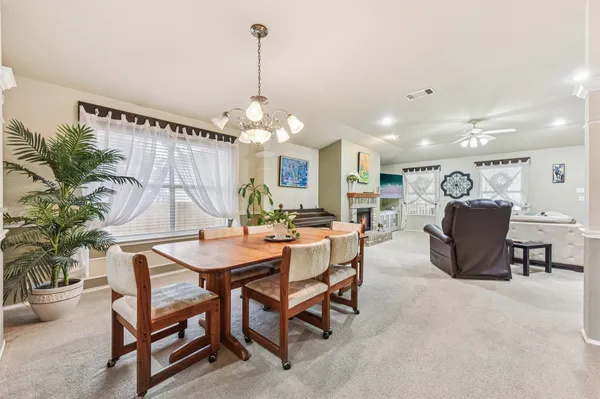 a view of a dining room with furniture