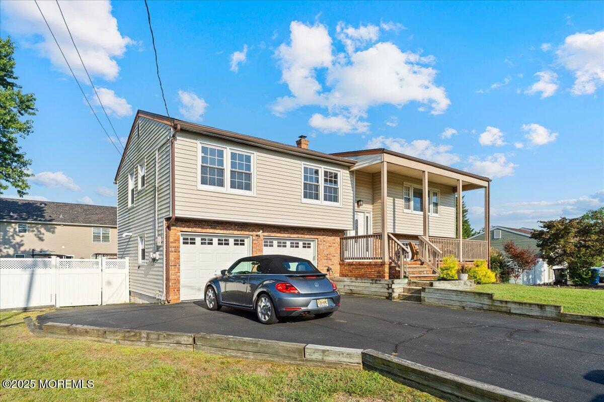 165 Port Road Brick, NJ 08723 - Photo 2 of 48 a view of a car park in front of house