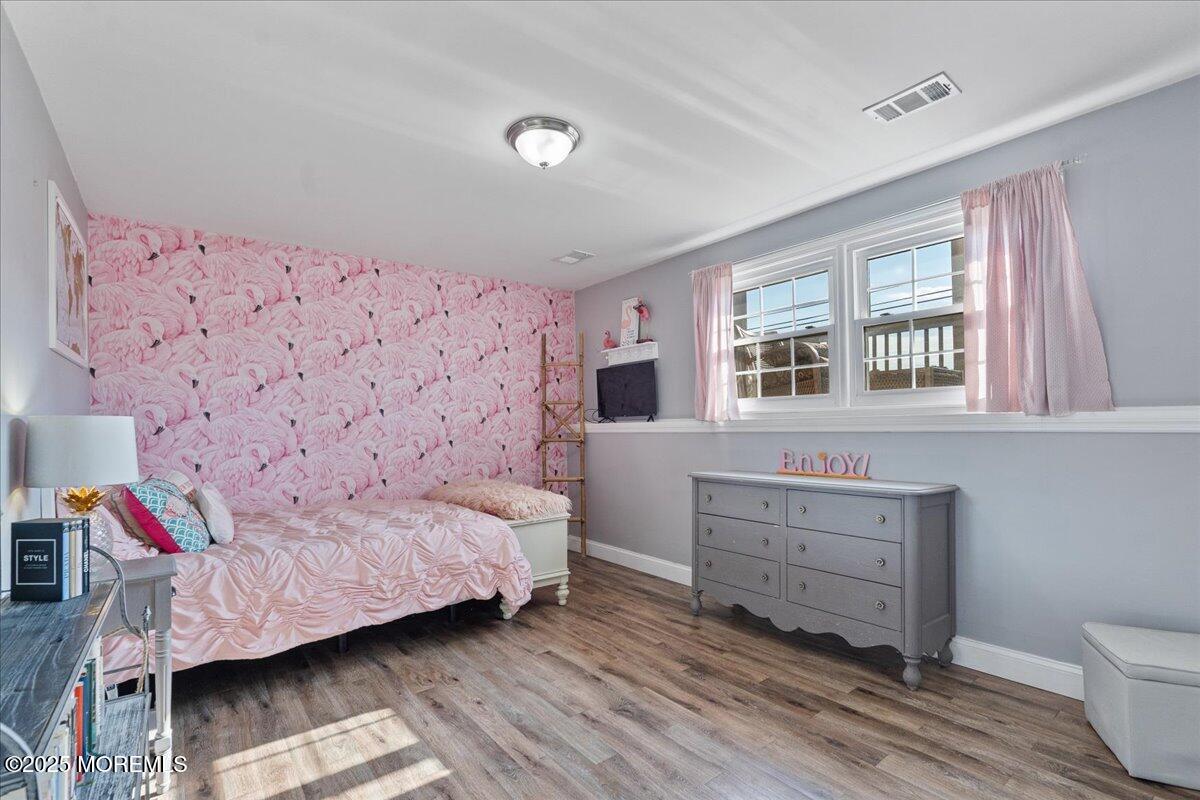 165 Port Road Brick, NJ 08723 - Photo 27 of 48 a bedroom with a bed and a couch