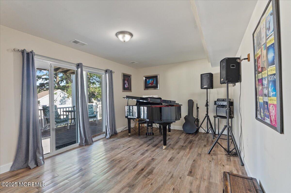 165 Port Road Brick, NJ 08723 - Photo 29 of 48 a view of a livingroom with furniture and a flat screen tv