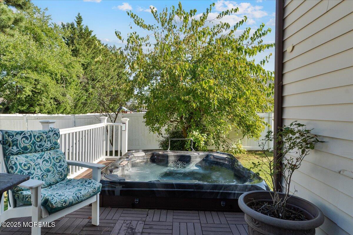 165 Port Road Brick, NJ 08723 - Photo 33 of 48 a wooden bench sitting in front of a house