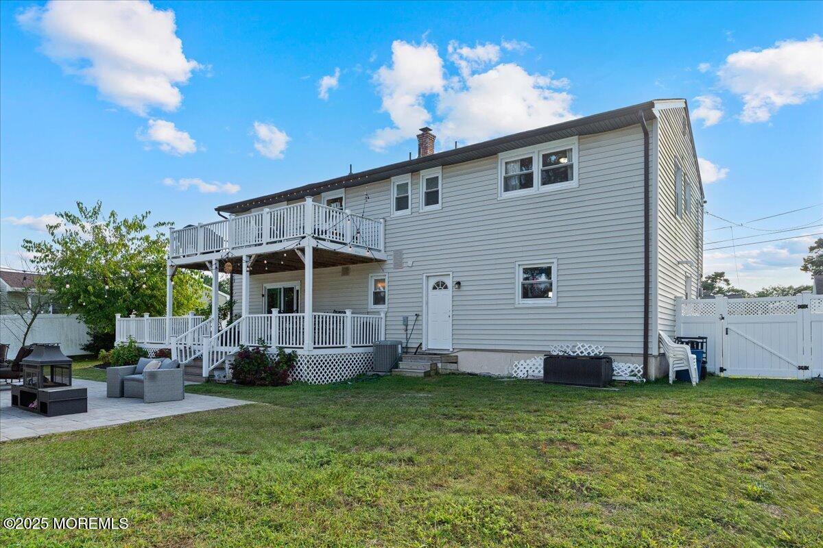 165 Port Road Brick, NJ 08723 - Photo 38 of 48 a view of a house with backyard