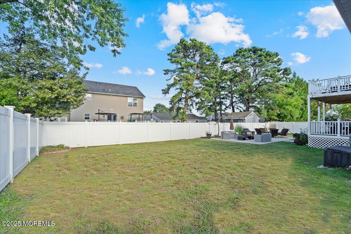 165 Port Road Brick, NJ 08723 - Photo 39 of 48 a view of a house with backyard and sitting area