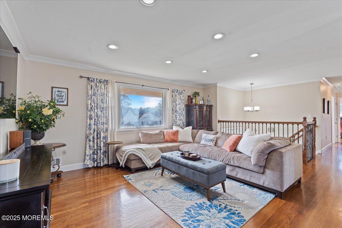 165 Port Road Brick, NJ 08723 - Photo 4 of 48 a living room with furniture and a potted plant