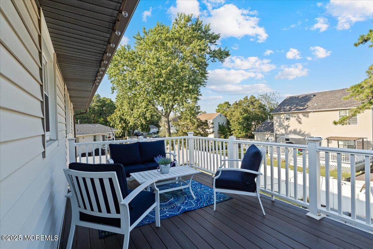 165 Port Road Brick, NJ 08723 - Photo 43 of 48 a view of balcony with furniture and wooden deck