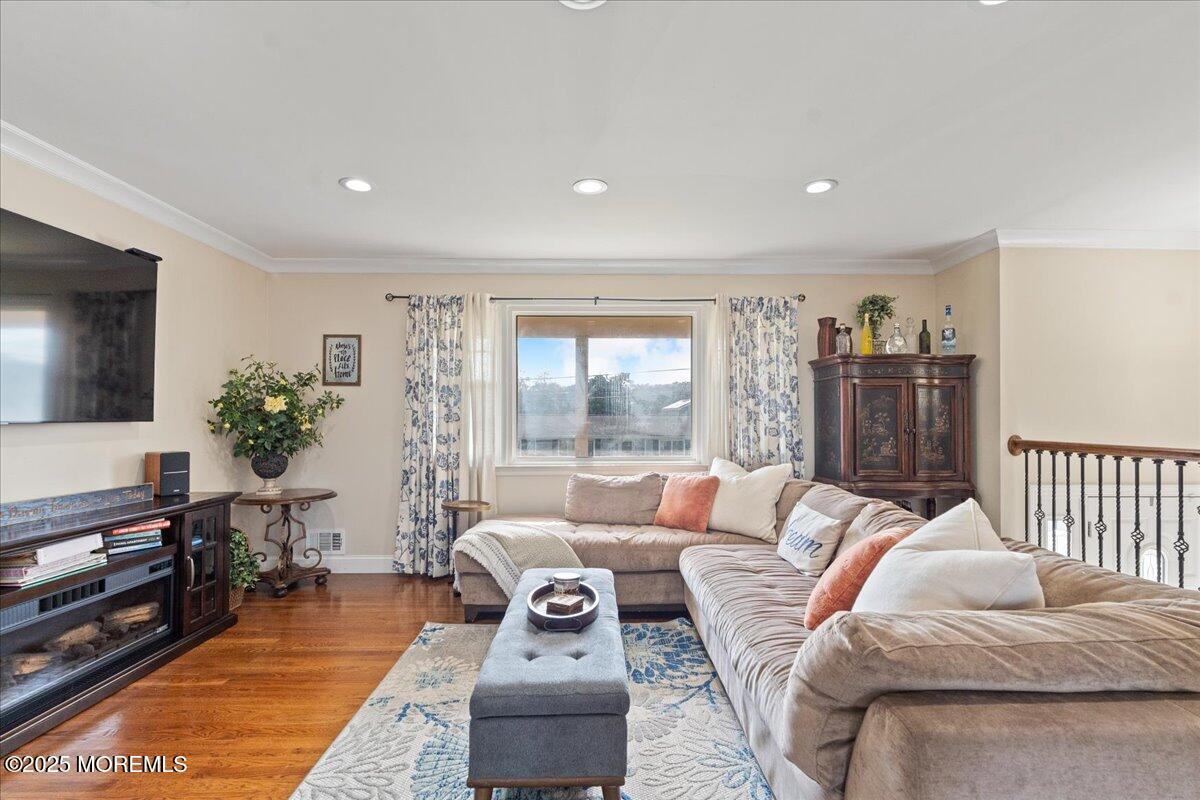 165 Port Road Brick, NJ 08723 - Photo 5 of 48 a living room with furniture and a flat screen tv