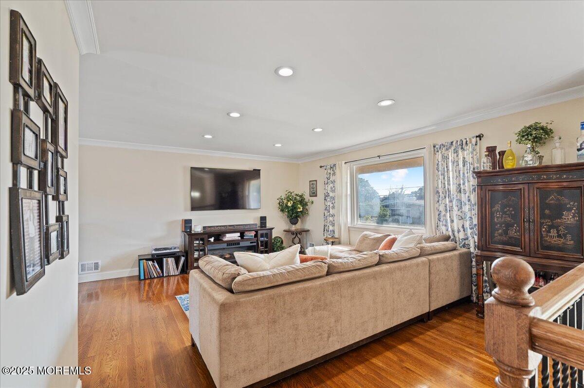 165 Port Road Brick, NJ 08723 - Photo 6 of 48 a living room with furniture and a flat screen tv